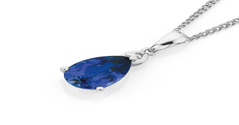 9ct White Gold Created Ceylon Sapphire & Diamond Pendant in Blue | Prouds