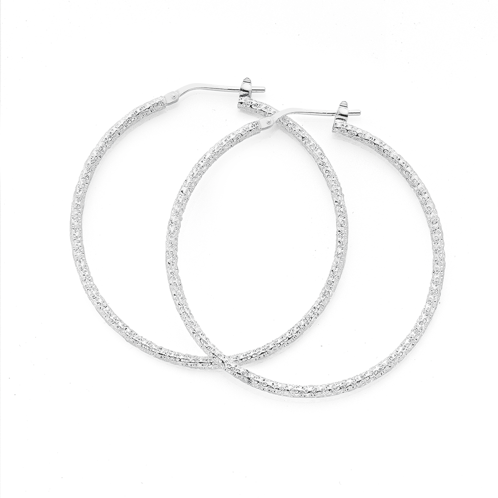 Silver twist store creole earrings