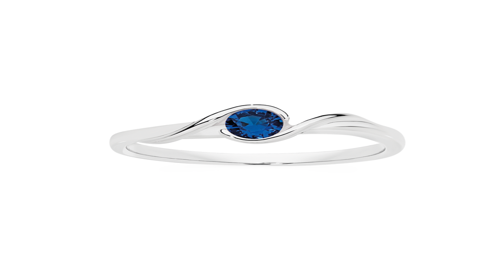 Silver Blue Cz Bezel Ribbon Shoulder Ring in Blue | Prouds